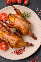 Roasted quail, partridge or pigeon stuffed with orange with spices and herbs