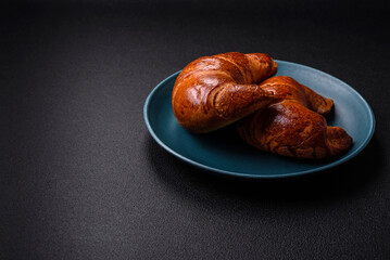 Delicious baked crispy croissants as an element of an invigorating, nutritious breakfast