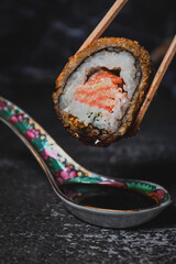 sushi with chopsticks