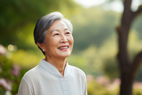 Health and beauty, a senior Asian woman with a happy smile