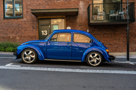 Gothenburg, Sweden - september 06 2023: Blue 1973 Volkswagen Beetle 1303 S parked on a slope.