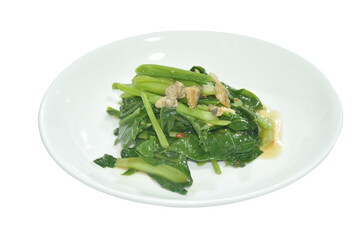 fried Chinese kale with chop salty fish in oyster sauce on plate 