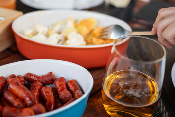Close up image of traditional Tapas gastronomy in Spain on a terrace with beer
