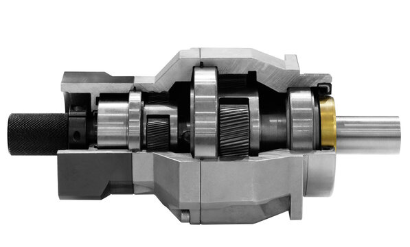 Gear speed reducer cross section isolated on white, Reducer gearbox close up on white, industrial concept