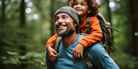 Father-Son Bonding: Carrying Son on Hike Through Forest Trail