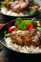 Baked balsamic chicken thighs with rice and vegetables