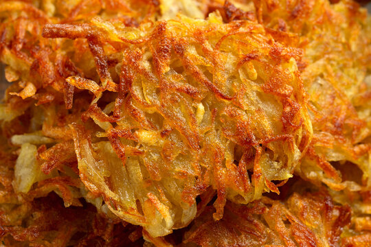 Potato rosti or hash brown close up, background
