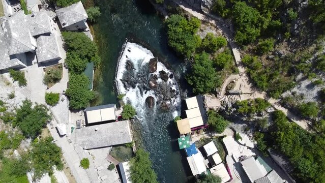 Waterfall on areal river drone video