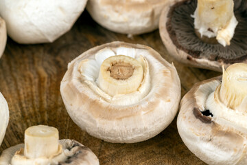 peeled and washed mushrooms while cooking on the table