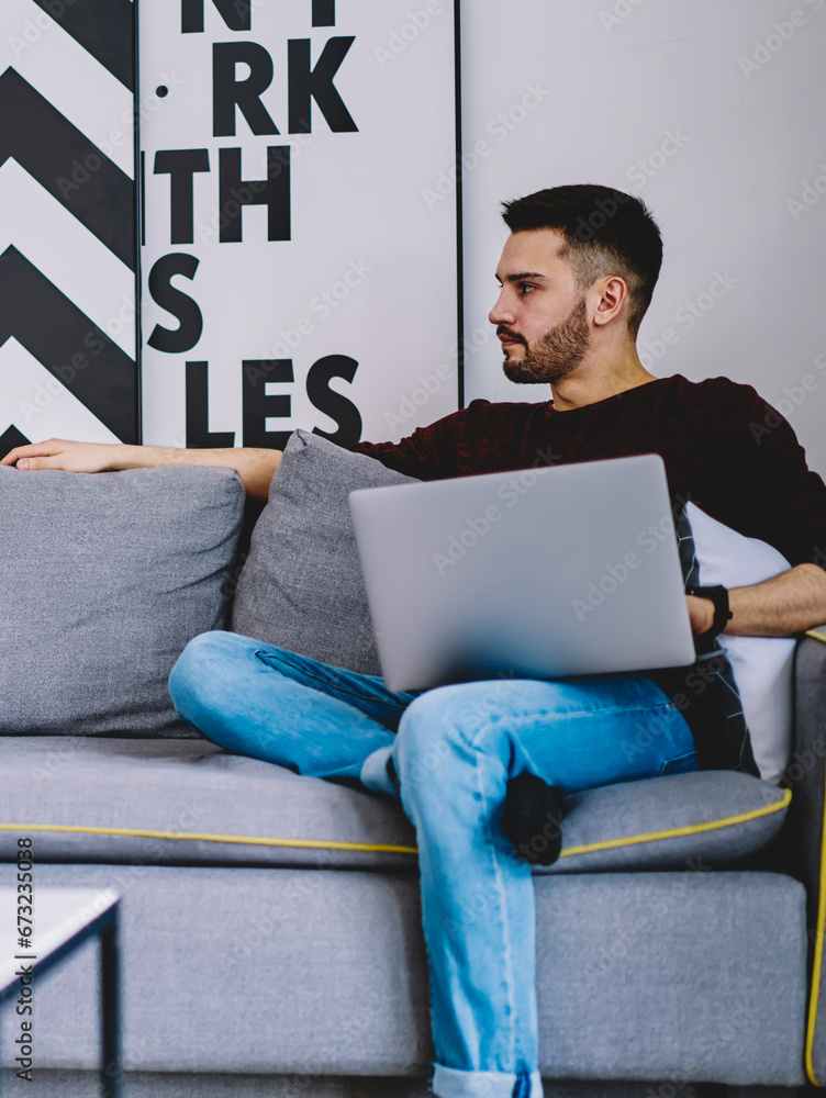 Poster positive female blogger reading funny message from friend in social network while resting