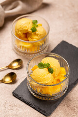 Natural mango ice cream in glass cremans