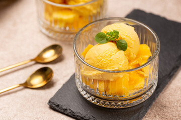 Natural mango ice cream in glass cremans