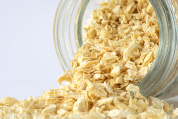 Minced Ginger Root Spilled from a Jar