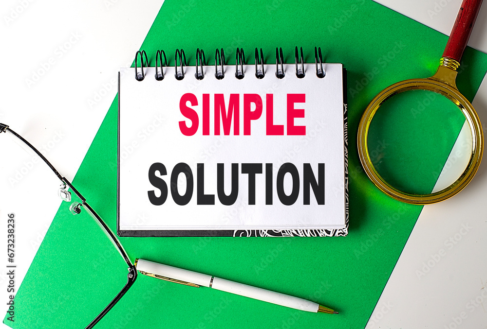 Poster simple solution text on notebook on green paper