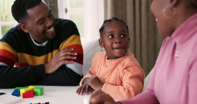 Family, child and high five at home for education, learning and development success for school. African woman, man or parents and girl playing, teaching or celebrate achievement with toys on table