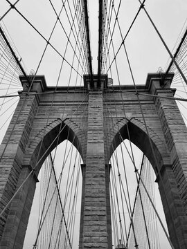 Monochromatic image of the iconic Brooklyn Bridge in New York City, USA