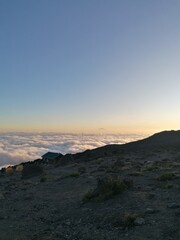 Fototapeta na wymiar Beautiful mountain views from above the clouds on Mount Kilimanjaro in Tanzania, Africa