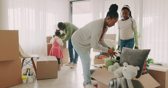 New home, parents or children packing boxes as a black family ready to move out for property relocation. Dream house, security or African children leaving an apartment with dad, mom or support