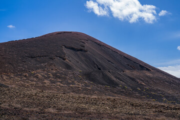 View of the impressive crater on the side of the slope of one of the most important volcanoes on the island. Photography taken in Fuerteventura, Canary Islands, Spain