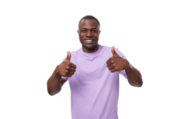 young positive american man in a lilac t-shirt is inspired by an idea and success on a white background