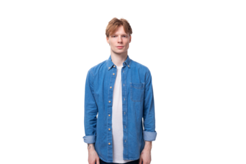 young handsome red-haired guy dressed in a blue shirt on a white background with copy space