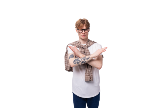 young pensive smart european student man with golden red hair wearing glasses on white background