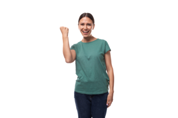 a young woman with black hair and a slender figure dressed in a green t-shirt feels joy