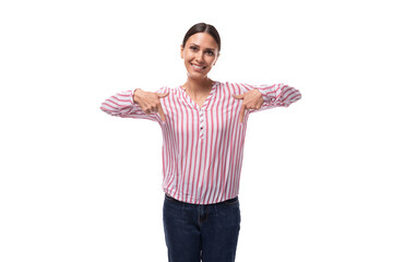 young brunette business woman dressed in a striped shirt is experiencing joy on a white background