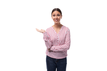 young smart caucasian woman with black hair gathered in a ponytail dressed in a striped blouse stands thoughtfully