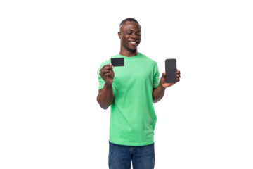 young confident american male advertiser dressed in green mockup t-shirt holding credit card and smartphone