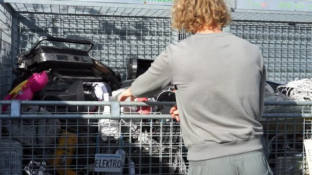 throws electrical equipment into a special waste yard