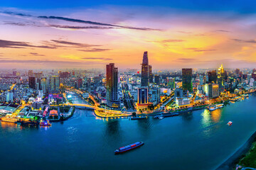 Fototapeta premium Aerial view of Ho chi minh city or Saigon city at twilight in Vietnam.