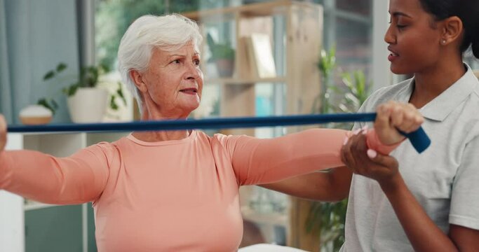 Old woman, physiotherapist and physical therapy, resistance band and muscle with strength training and health. Female people at clinic, patient and rehabilitation, chiropractic and elderly care