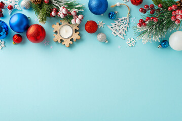 New Year's decoration idea captured from top view, showcasing variety of colorful baubles,...