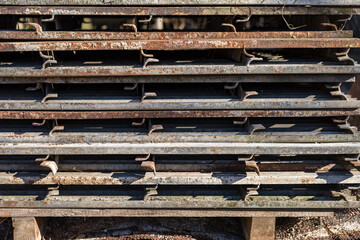 a Tower of Stacked Metal Bars That Form an Impressive Structure