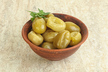 Pickled green tomato in the bowl