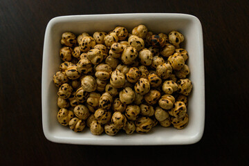 Roasted chickpeas in the ceramic bowl