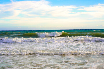 high waves encroaching onto land