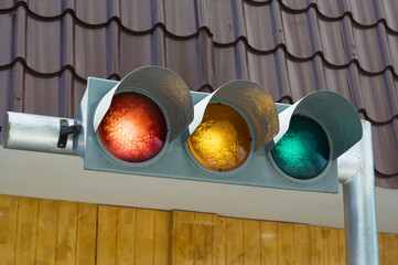Traffic light on urban location.