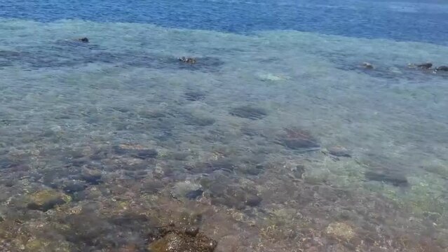 This is the Blue Hole in Dahab, South Sinai, Egypt. It's famous for snorkelling and diving. It's called Diver's Cemetery. It's a landmark in Egypt.