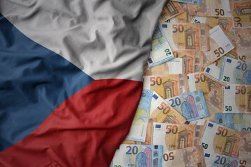 colorful waving national flag of czech republic on a euro money background. finance concept