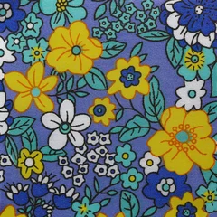 Zelfklevend Fotobehang Floral pattern fabric design closeup in blue and yellow © Shy Radar