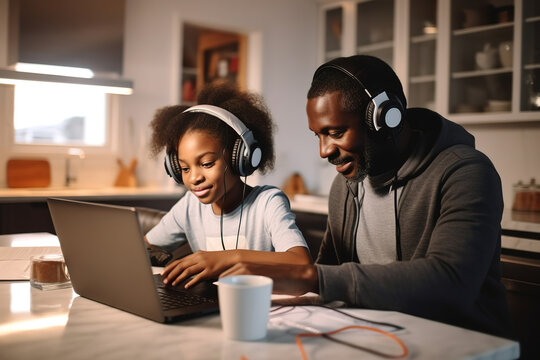 African American father helping girl remotely learning with laptop, interesting app for children, using modern tech, homeschooling, making homework, clever kid and self education at home concept.