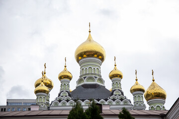 Fototapeta na wymiar Domes of Saint Nicholas Cathedral the Holy Intercession Convent for Women
