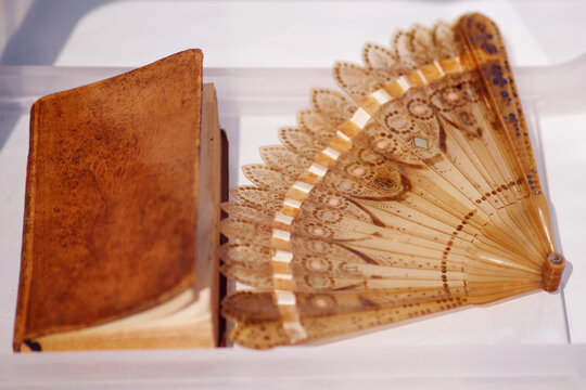 Book and fan of the early 19th century with metal and beads decoration