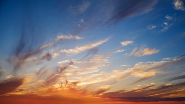Colorful dramatic sky with cloud at sunset.Sky clouds at sunset.