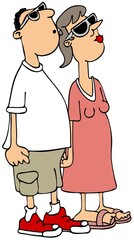 A young couple watching a solar eclipse