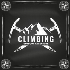 Climbing badge, logo design on chalkboard. Vector. Concept for shirt or logo, print, stamp or tee. Vintage typography design with mountain and old metal climbing ice-axe silhouette. Outdoors adventure