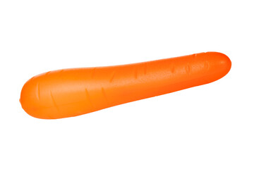 sweet orange carrot fruit plastic toy artificial isolated on white background close-up
