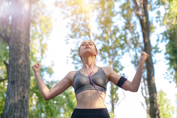 Successful raising arms after cross track running